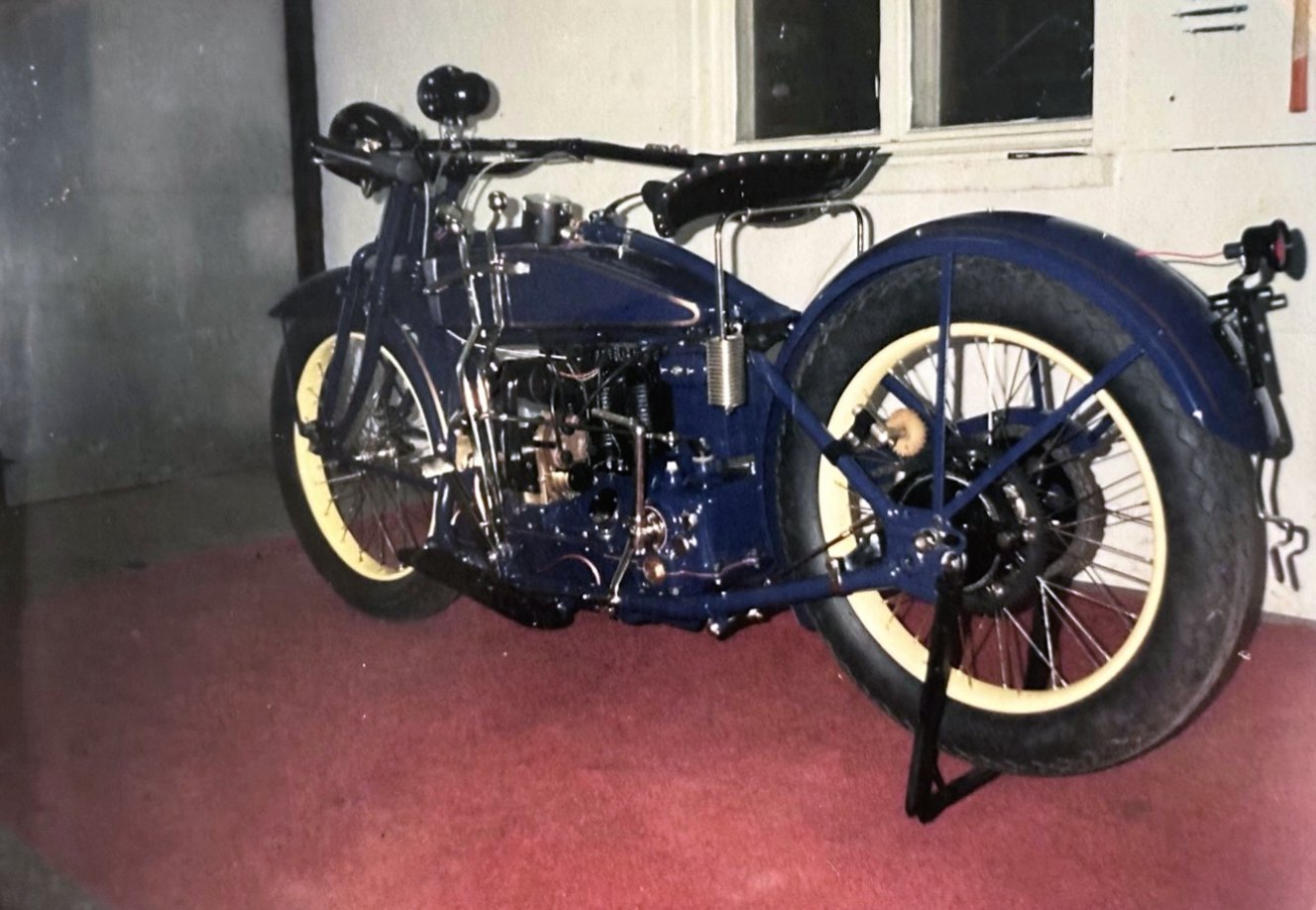 A dark blue Henderson motorcycle