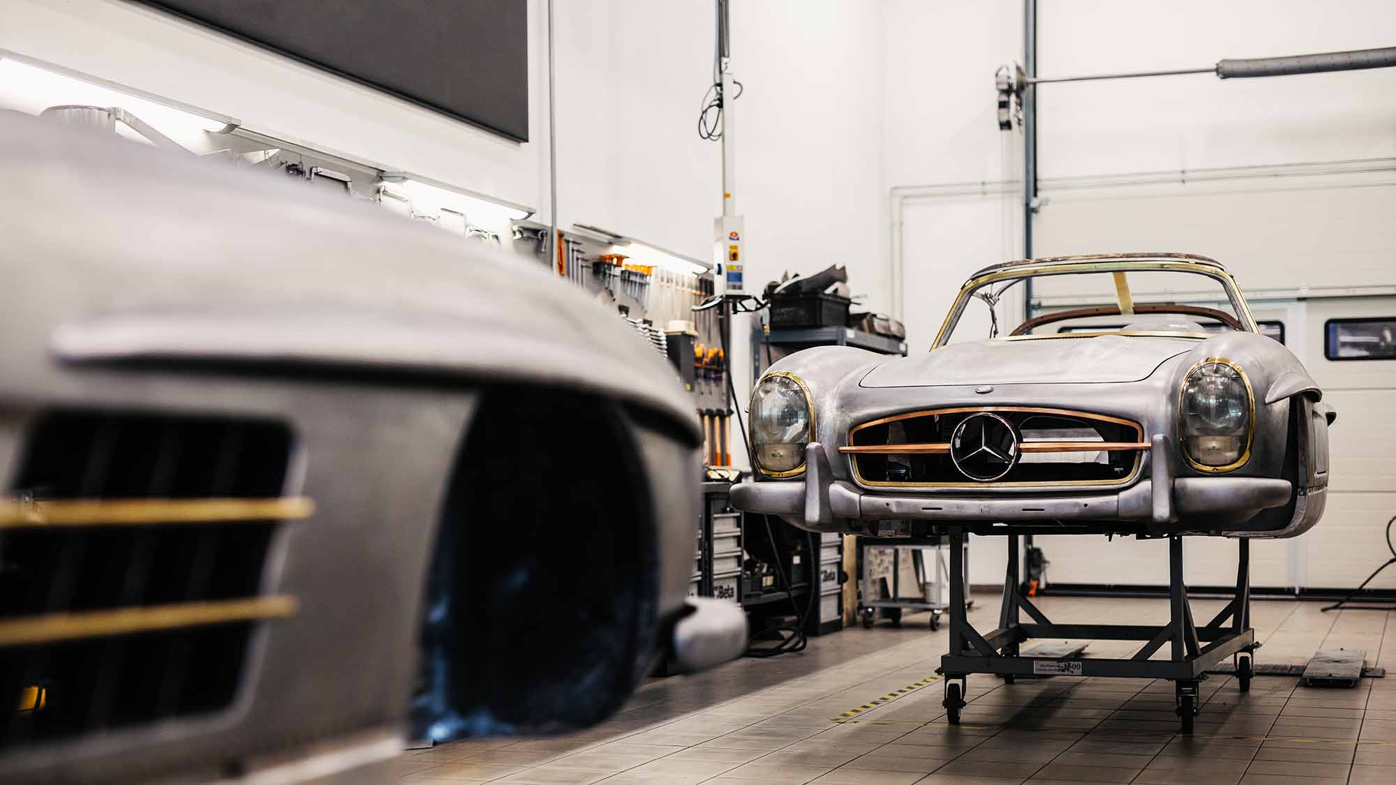 Two 300 SL bodies in the Motor Classic workshop